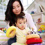 Lamaze - Rainbow Stacking Rings Toy, Help Baby Develop Fine Motor Skills And Hand-Eye Coordination With Multiple Textures, Bold Colors, Playful Patterns And Crinkly Sounds, 6 Months And Older