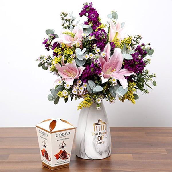 Pink & Purple Flowers In Vase With Truffles Pink & Purple Flowers In Vase With Truffles